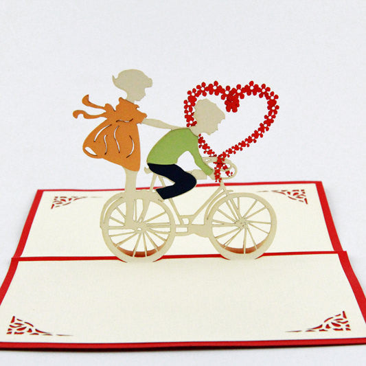 Love bicycle boy and girl heart pop up card greeting card