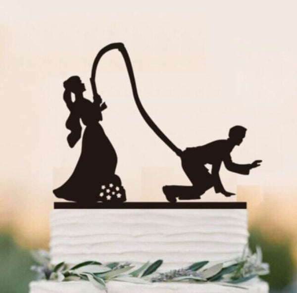 Bride hooking the groom wedding cake topper, funny party decor